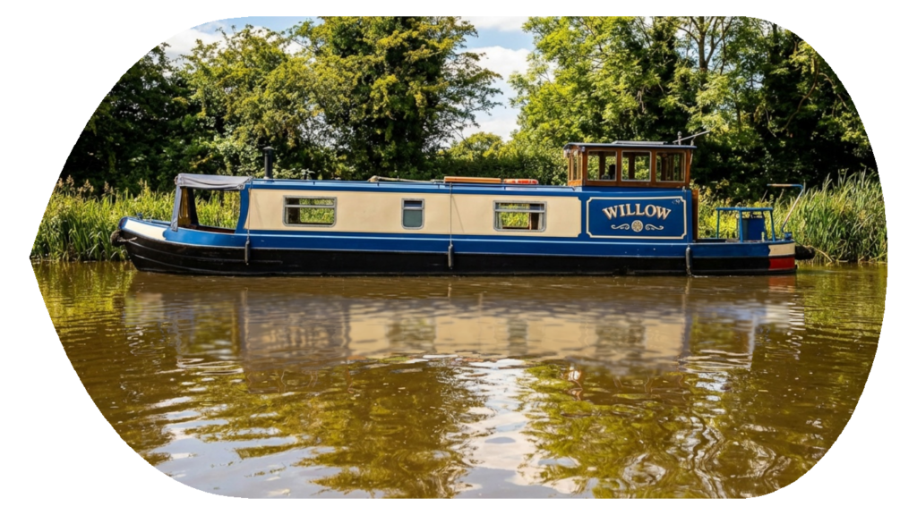 Canal boat in tranquil setting with reflection in water